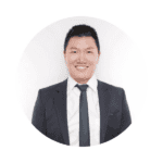 Darren Lim, Board Member, pictured in a suit.
